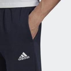 ADIDAS Essentials Fleece Regular Tapered Pants -Fitness Equipment Store k5bdc7d6db8edc46769bfcba16d5d495e